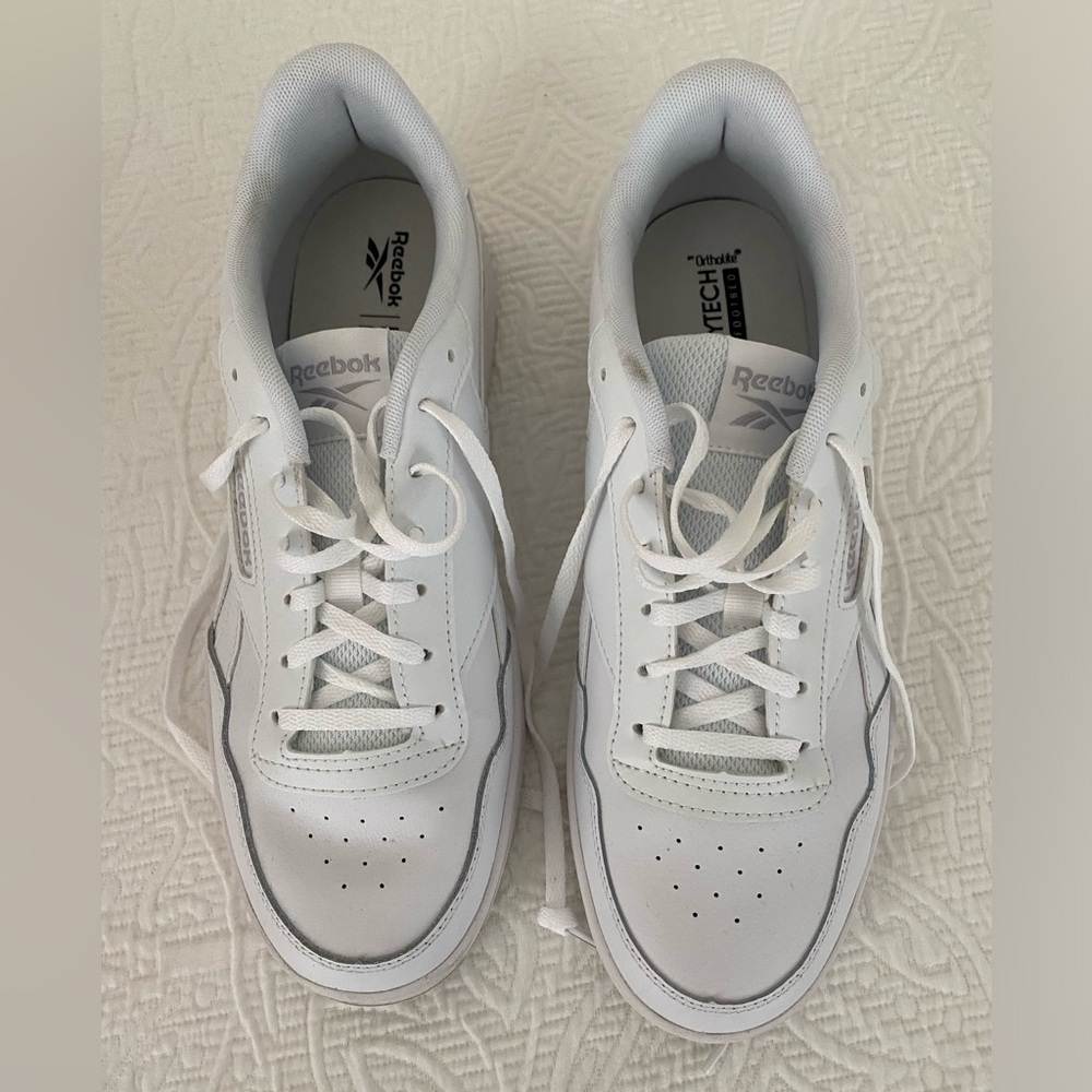 Almost brand new. Worn twice and felt they were too small.